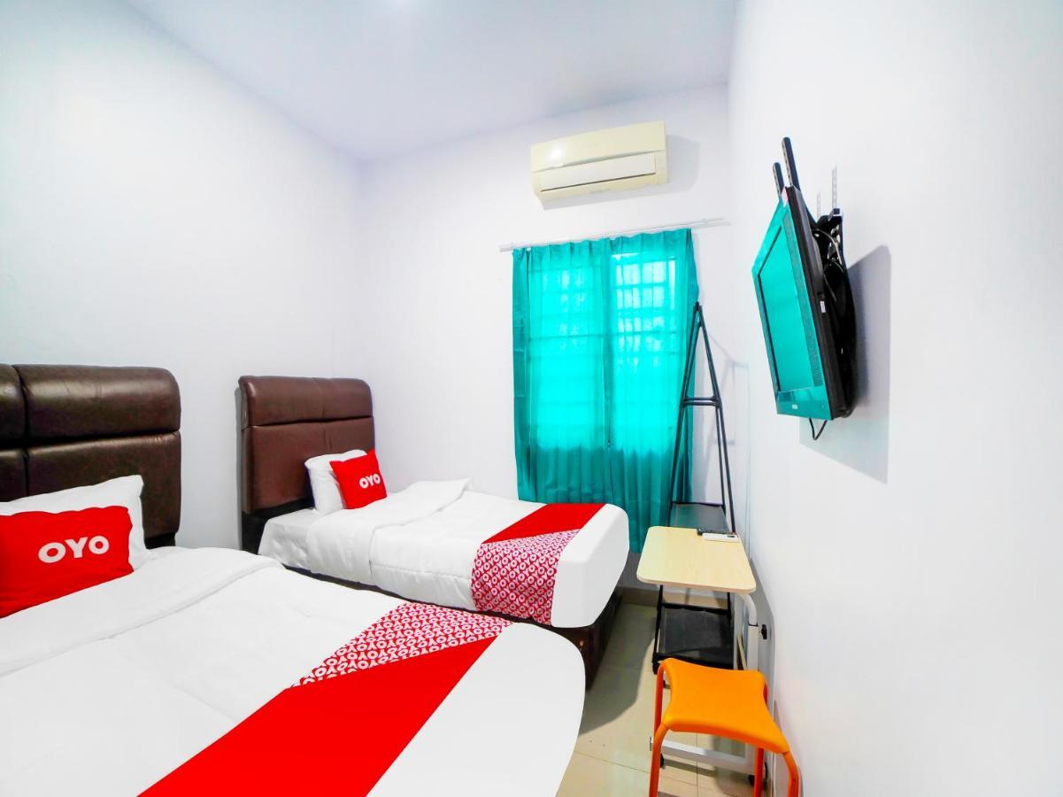 Oyo 91283 Sg Premium Guest House Medan Eksteriør bilde